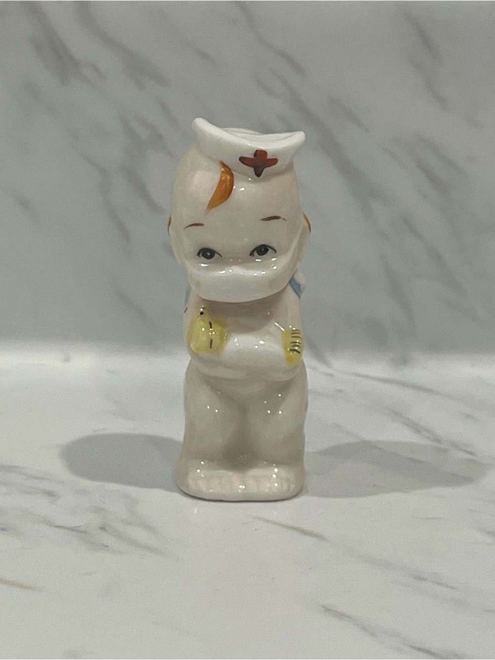 Vintage Ceramic Nurse Figurine - White with Yellow & Orange Accents